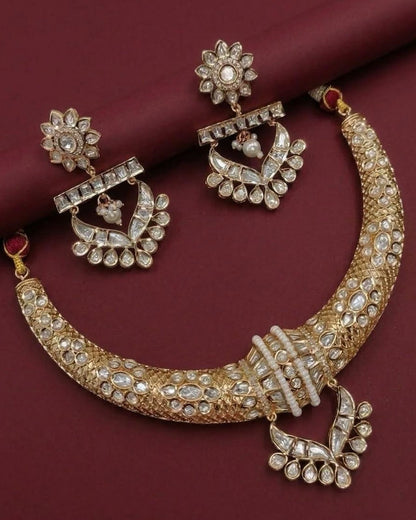 Make a statement with our Kundan Exclusive Hasli Necklace Set, crafted to add timeless elegance to every occasion. Featuring premium kundan stones with a luxurious finish, this handcrafted set is perfect for weddings, festive celebrations, and special events.