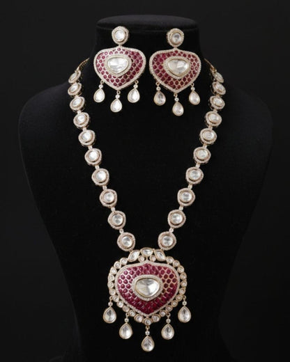 Elegant Kundan Polki pendant long necklace featuring intricately handcrafted uncut Polki stones, detailed kundan work, and a luxurious traditional design. Perfect for weddings, festive occasions, and ethnic outfits, this statement necklace adds timeless royal charm to any look.