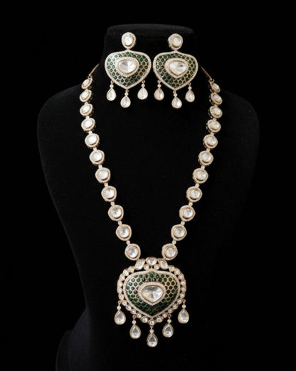 Elegant Kundan Polki pendant long necklace featuring intricately handcrafted uncut Polki stones, detailed kundan work, and a luxurious traditional design. Perfect for weddings, festive occasions, and ethnic outfits, this statement necklace adds timeless royal charm to any look.