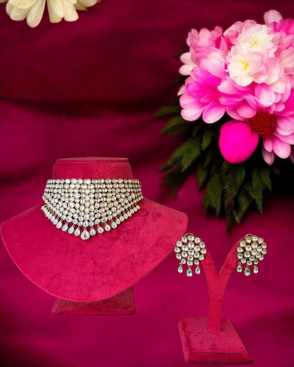 Noor Polki Beauty Necklace featuring sparkling Polki-style stones in an elegant, handcrafted design. This statement necklace blends traditional charm with timeless sophistication, making it ideal for weddings, festive occasions, bridal wear, and ethnic celebrations.
